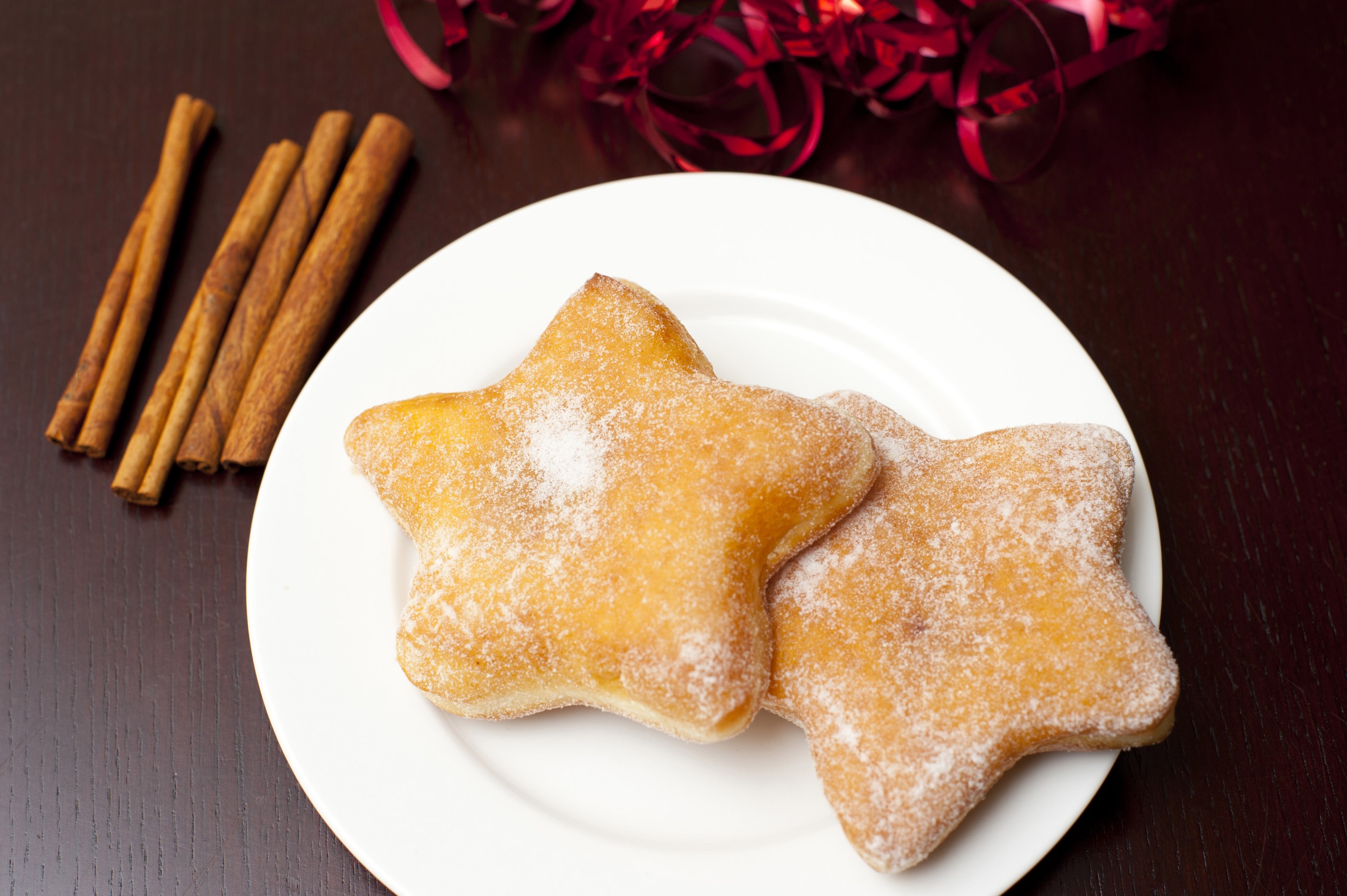 Star shaped donuts on a plate.